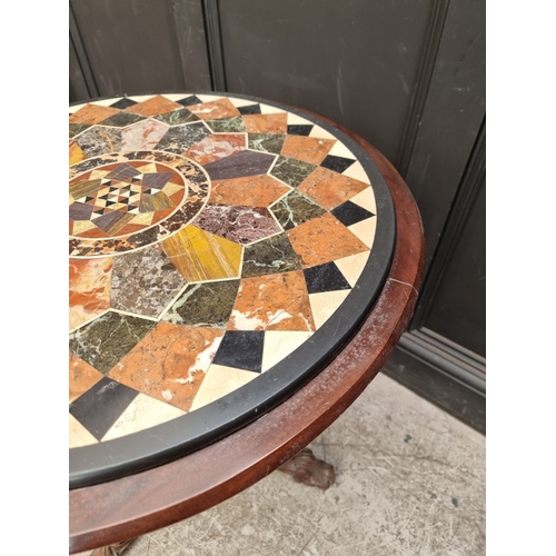 1022 - A Victorian walnut and specimen marble tripod occasional table, 67cm diameter.