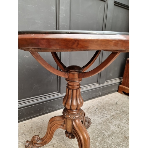 1022 - A Victorian walnut and specimen marble tripod occasional table, 67cm diameter.
