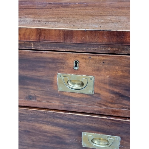 1039 - A 19th century mahogany and brass bound campaign style chest of drawers, in two parts, with counters... 