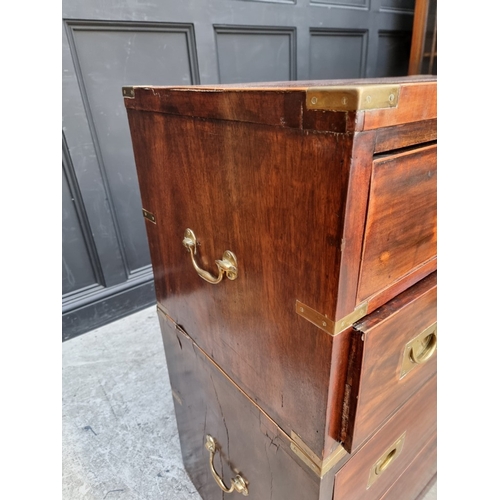 1039 - A 19th century mahogany and brass bound campaign style chest of drawers, in two parts, with counters... 