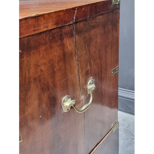 1039 - A 19th century mahogany and brass bound campaign style chest of drawers, in two parts, with counters... 