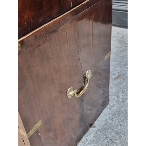 1039 - A 19th century mahogany and brass bound campaign style chest of drawers, in two parts, with counters... 