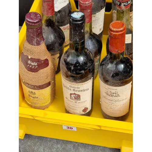 30 - A mixed group of Wine and similar. (12)