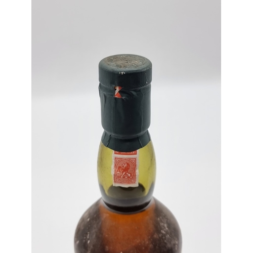 45 - A 70cl bottle of Lagavulin 16 Year Old Whisky, (label torn).