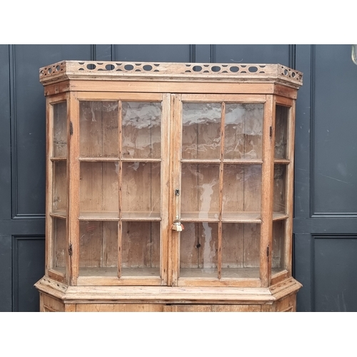 1000 - An antique pine bookcase, 143cm wide.