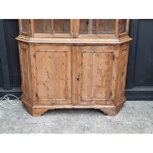 1000 - An antique pine bookcase, 143cm wide.