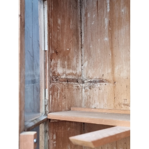 1000 - An antique pine bookcase, 143cm wide.