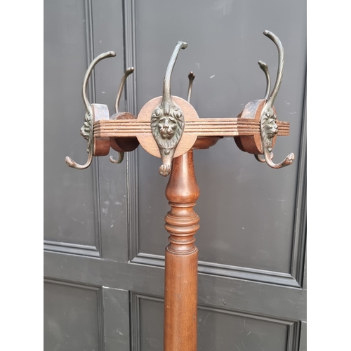 1001 - A mahogany tripod hat and coat stand, 188.5cm high.