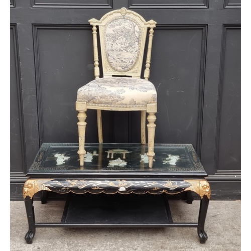 1015 - A Chinese black lacquered and relief decorated rectangular low occasional table, 105cm wide; togethe... 