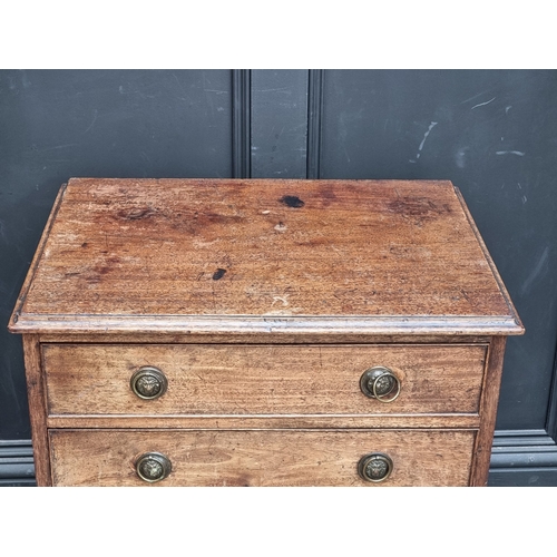 1021 - A small antique mahogany four drawer chest, 64cm wide.