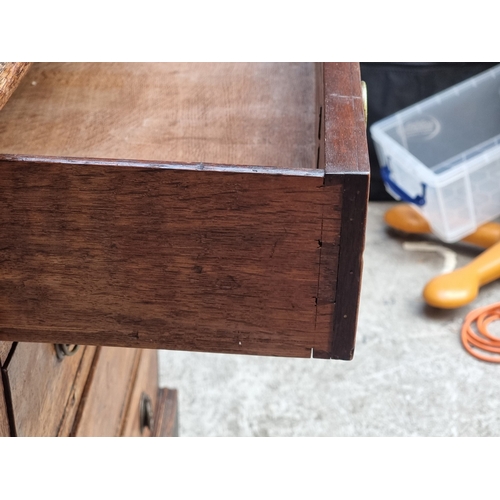 1021 - A small antique mahogany four drawer chest, 64cm wide.