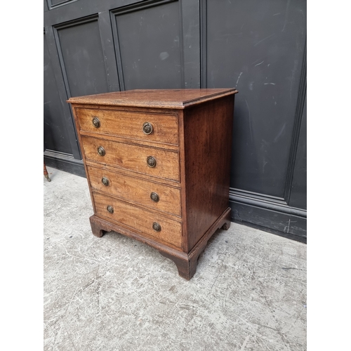 1021 - A small antique mahogany four drawer chest, 64cm wide.