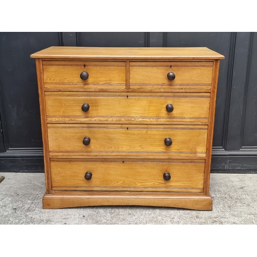1024 - A Victorian ash chest of drawers, with ebonized knob handles, 107.5cm wide.