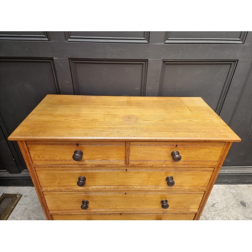 1024 - A Victorian ash chest of drawers, with ebonized knob handles, 107.5cm wide.