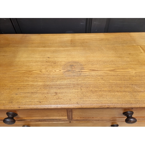 1024 - A Victorian ash chest of drawers, with ebonized knob handles, 107.5cm wide.