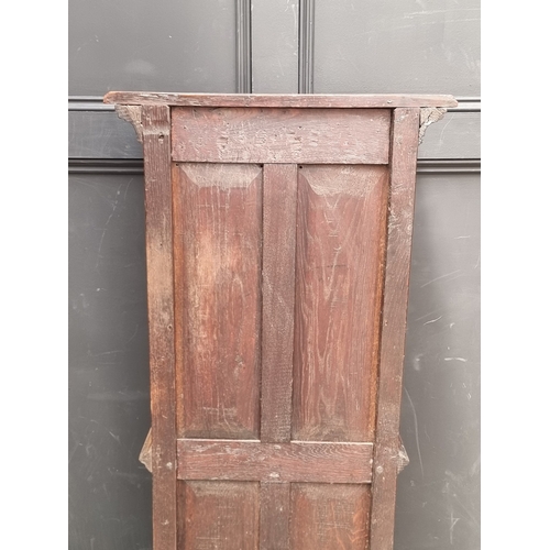 1026 - A 17th century style carved oak side cabinet,&nbsp;with&nbsp;tracery and&nbsp;linenfold panels, 132c... 
