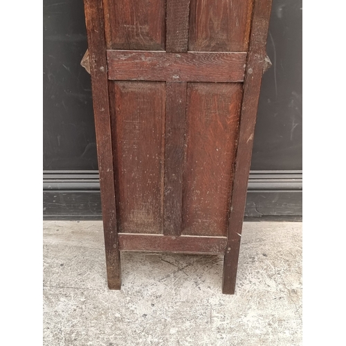 1026 - A 17th century style carved oak side cabinet,&nbsp;with&nbsp;tracery and&nbsp;linenfold panels, 132c... 