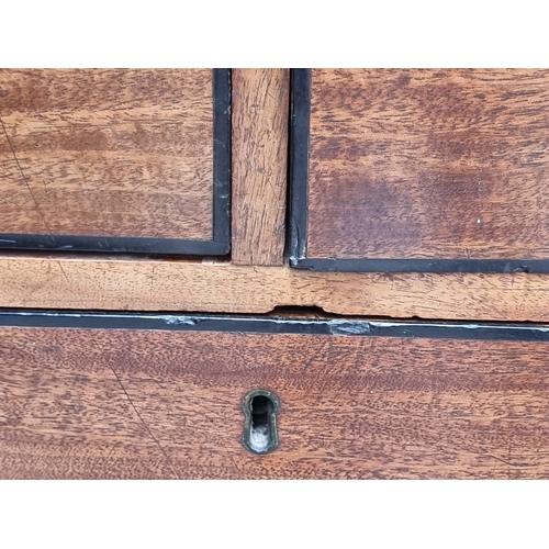 1028 - A Regency mahogany and ebony strung chest of drawers, 98cm wide.