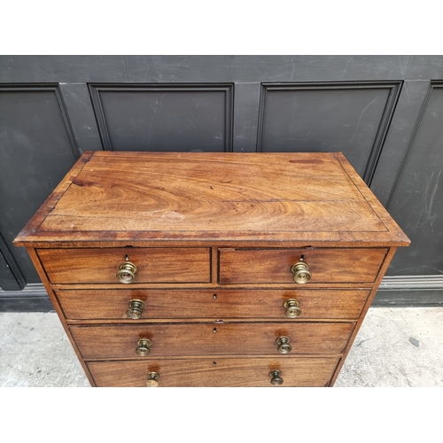 1028 - A Regency mahogany and ebony strung chest of drawers, 98cm wide.