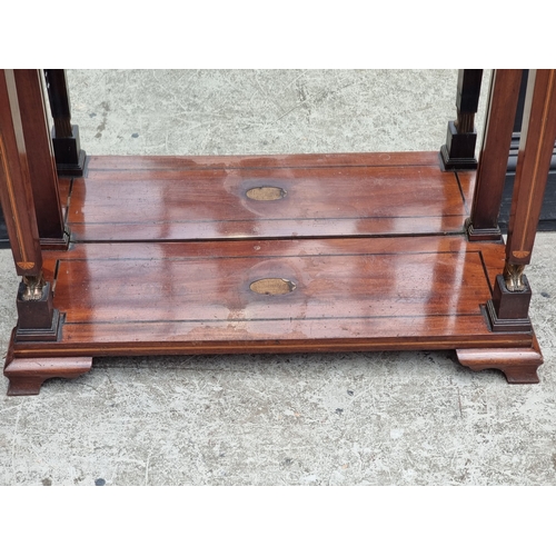 1031 - An Empire style mahogany and inlaid pier table, with mirror panel, 87.5cm wide.