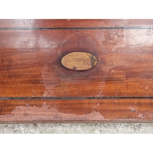 1031 - An Empire style mahogany and inlaid pier table, with mirror panel, 87.5cm wide.