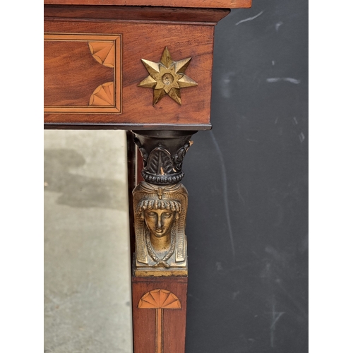 1031 - An Empire style mahogany and inlaid pier table, with mirror panel, 87.5cm wide.