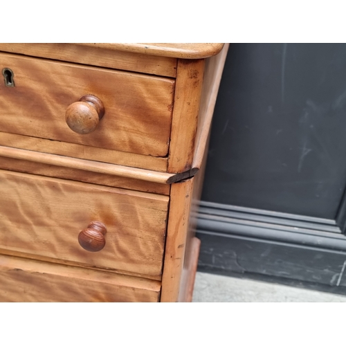 1034 - A Victorian satin birch pedestal desk, 120.5cm wide.