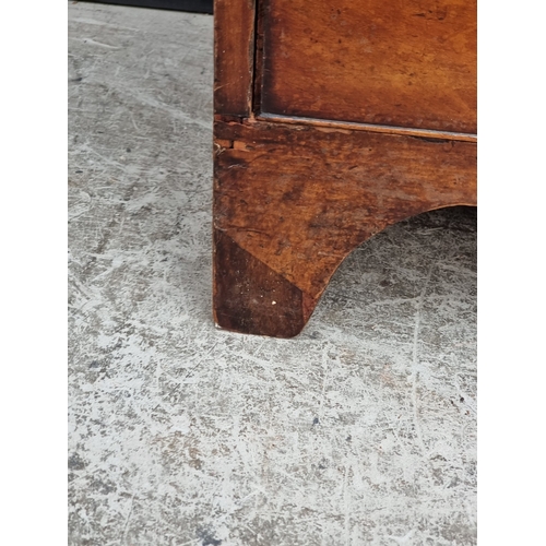 1035 - A Victorian mahogany chest of drawers, with bone inset knob handles, 92cm wide.