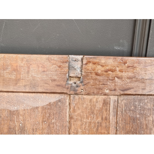 1038 - A small late 17th century oak panelled coffer, 83cm wide.