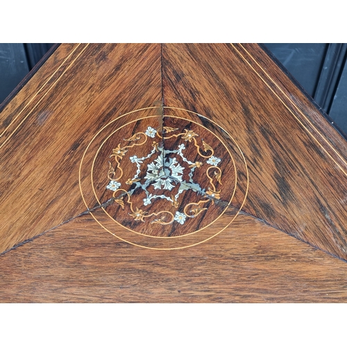 1043 - A circa 1900 rosewood and inlaid drop leaf occasional table, 73cm wide when open.