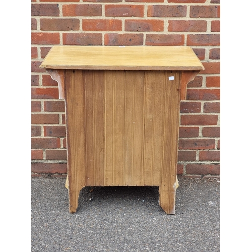1002 - An early 20th century faux grained three drawer chest, 75.5cm wide.