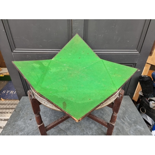 1020 - An unusual Middle Eastern brass and stained beech metamorphic 'Mosq Card Table', the reversable top ... 