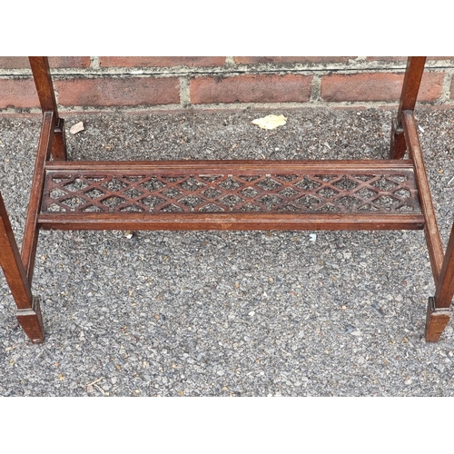 1025 - A circa 1900 walnut rectangular occasional table, with pierced frieze and stretcher, 76cm wide.... 