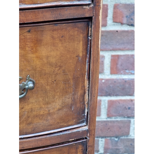 1042 - An old reproduction walnut bowfront narrow chest of drawers, 47.5cm wide.