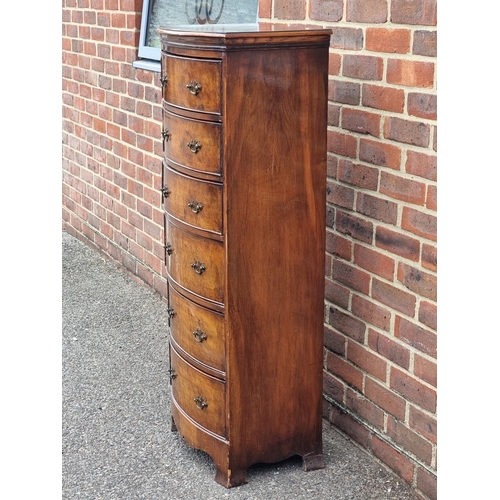 1042 - An old reproduction walnut bowfront narrow chest of drawers, 47.5cm wide.