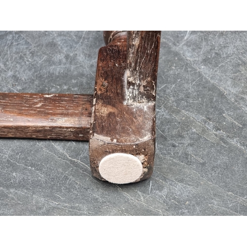1044 - A late 17th century oak joint stool, 44.5cm wide.