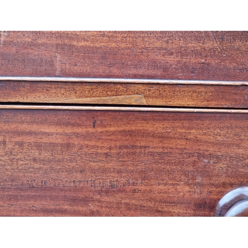 1046 - A large George III mahogany chest of drawers, in two parts, (probably on later feet), 113cm wide.... 