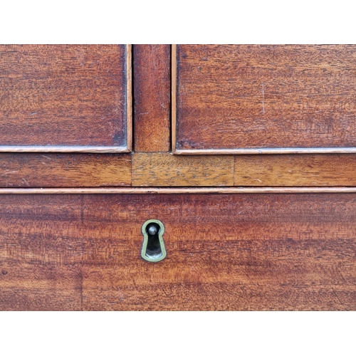1046 - A large George III mahogany chest of drawers, in two parts, (probably on later feet), 113cm wide.... 