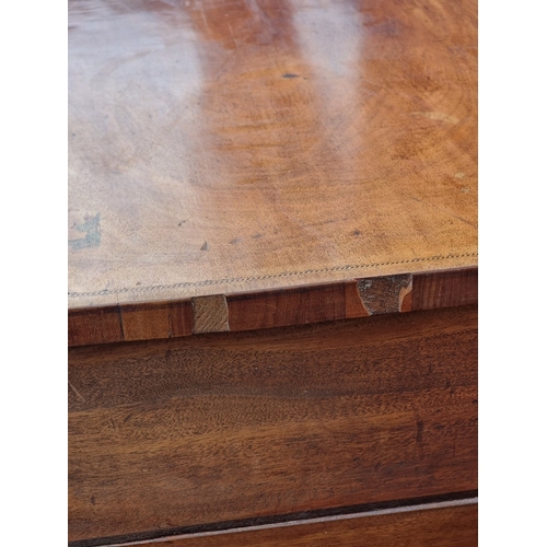 1047 - A George III mahogany and chequer strung bowfront kneehole side table, 107.5cm wide.... 