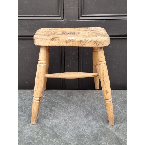 1048 - A Victorian pine and elm stool, 47cm high.