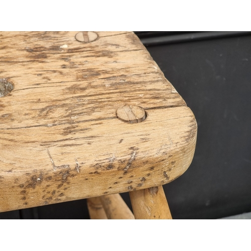 1048 - A Victorian pine and elm stool, 47cm high.