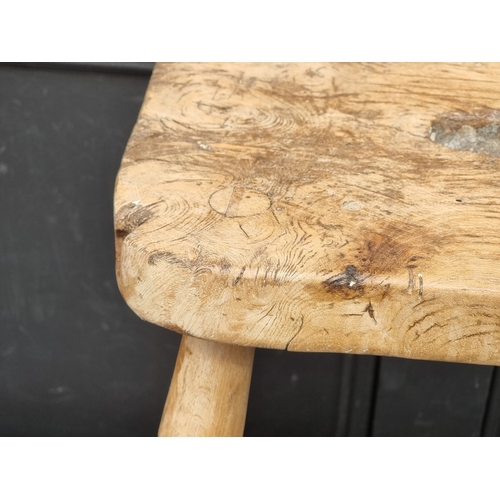 1048 - A Victorian pine and elm stool, 47cm high.