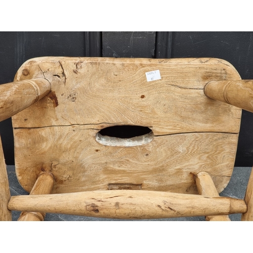 1048 - A Victorian pine and elm stool, 47cm high.