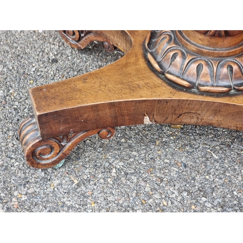 1050 - A Victorian mahogany pedestal card table, 91.5cm wide.