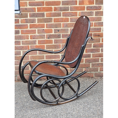 1053 - A rare Art Nouveau bentwood rocking chair, labelled 'Fischel'.