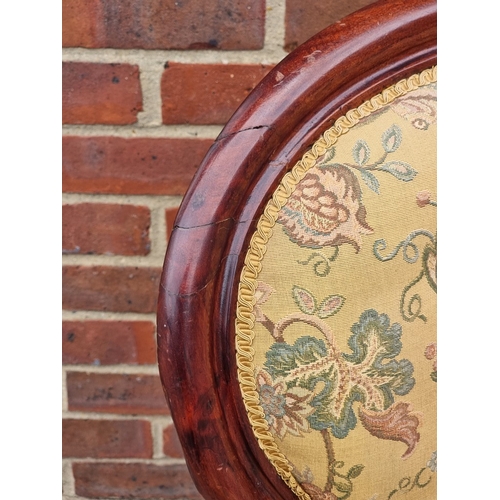 1058 - A Victorian mahogany and button upholstered occasional armchair.