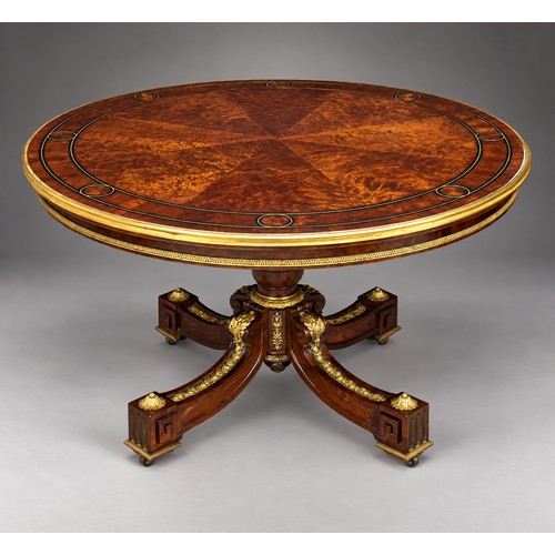 A good 19th century French ‘plum pudding’ mahogany, ebony strung, brass inlaid and mounted circular centre table, by Grohe Freres, Paris, stamped several times, 130.5cm diameter.
