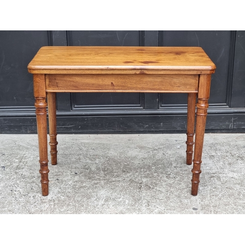 A Victorian walnut rectangular card table, with telescopic action.