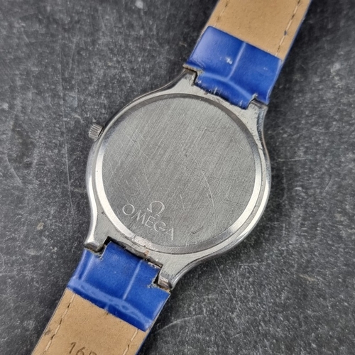 12 - A circa 1985 Omega 'De Ville' stainless steel and gold plated quartz wristwatch, 32mm, with Ankh cro... 