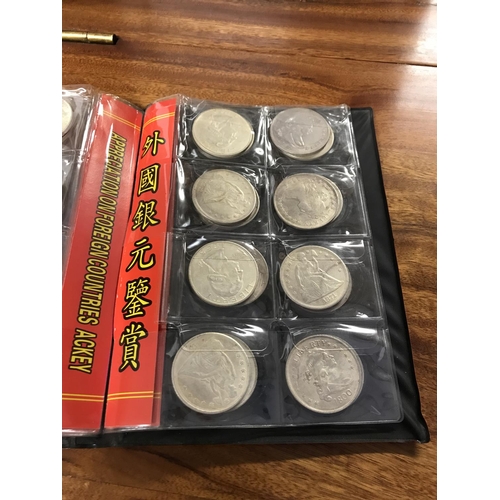 81 - Folder of assorted coins...